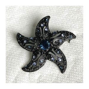 1928  Company Black Tone Baby Blue Jeweled Star Fish Brooch Pin